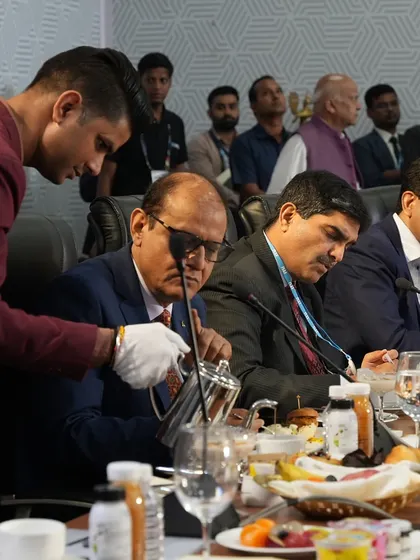 Attentive service during a formal luncheon for conference delegates. Our staff is trained to provide seamless and non-intrusive service during important meetings and discussions.