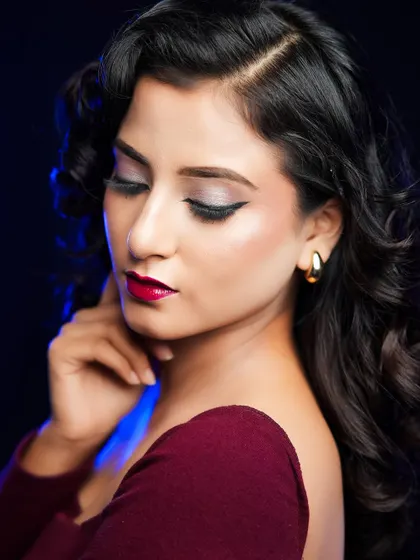 A beautiful close-up showing the flawless silver eyeshadow and the precision of the winged liner.