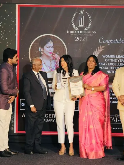 A proud moment on stage with my award. I hope my success inspires other women to pursue their passions relentlessly.