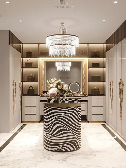 Another angle of the master walk-in closet, showing the open shelving for displaying bags and accessories, all beautifully lit to create a boutique-like experience.