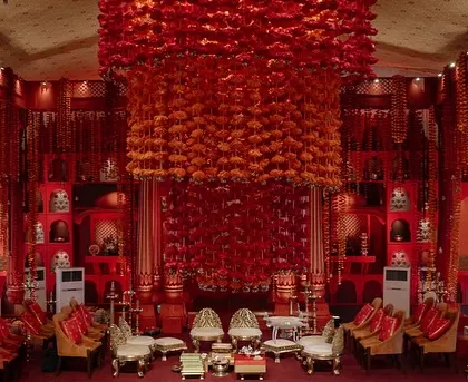 The groom's view of the breathtaking 'Lal Bagh' mandap, a testament to months of planning and detailed execution.