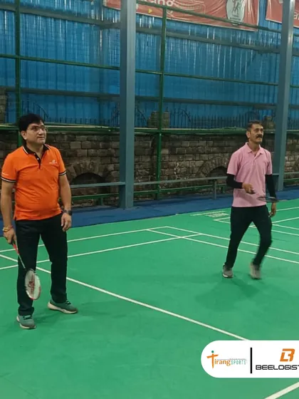 Two colleagues enjoying a casual game during their corporate event. Our facilities cater to all skill levels, ensuring everyone can participate and have a good time.