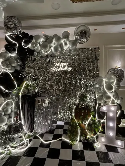 A full view of the glam birthday backdrop, showing how all the elements work together. The setup is perfect for photos and serves as the main focal point of the party space.