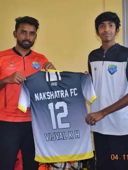 A new player receives his official Nakshatra FC jersey. This marks the beginning of their journey in the Karnataka Youth Premier League with us.