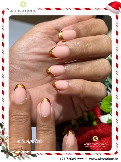 Another perspective on the elegant gold-tipped French manicure, perfect for festive occasions or adding a touch of glamour to your everyday look.