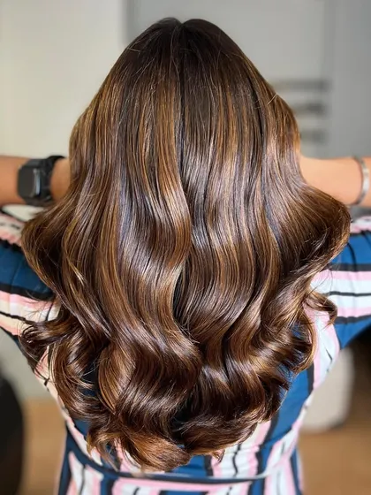 The shine and health of the hair after our bronde balayage service. We always prioritize keeping your hair strong and glossy.