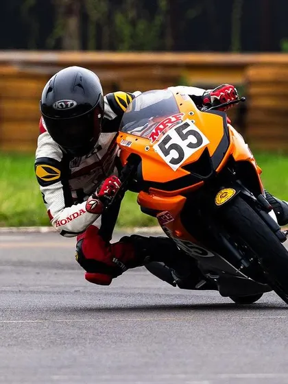 Hitting the apex with precision. This image shows Parichay Sharma demonstrating the core skills learned at our academy during a qualifying session for the Indian National Motorcycle Racing Championship (INMRC).