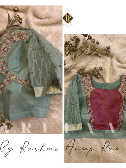 A pastel green blouse with a contrasting maroon yoke. The sleeves feature a unique sheer panel with a criss-cross pattern, adding a modern touch to the design.