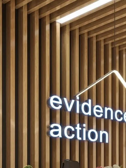 The reception area concept for EAII Advisors, featuring the company logo in 3D lettering against a backdrop of vertical wood slats. This design immediately establishes a modern and professional brand identity.