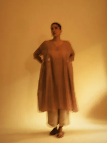An experimental shot using motion blur to create a dreamy, ethereal effect. This artistic approach conveys a sense of movement and fleeting beauty.