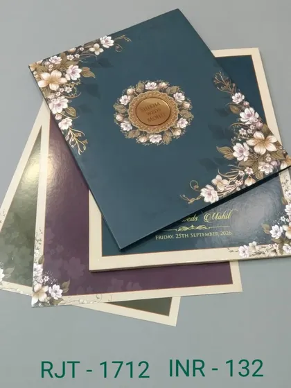 This invitation set is available in multiple colors, all featuring a classic floral border. The design is versatile and can be customized to fit your wedding's color scheme.