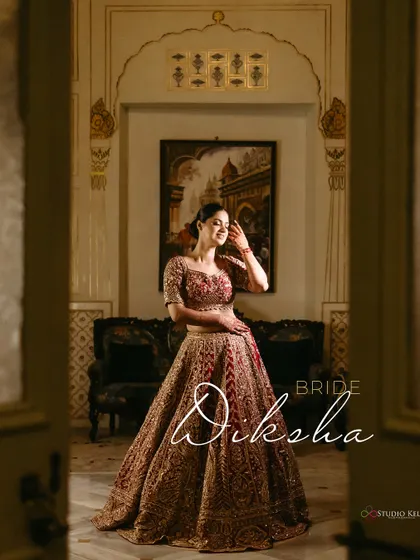 A regal bridal portrait, with the bride looking elegant in the royal interiors of the Laxmi Niwas Palace, Bikaner.
