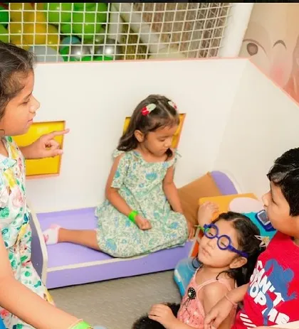 Children gather in one of our cozy pretend-play nooks for some imaginative fun.