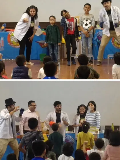We love getting the whole family involved. Here, parents join their kids on stage to participate in an experiment, making our shows a true family engagement activity.
