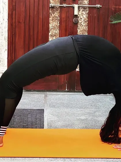 Another shot of the Wheel Pose. This pose requires a lot of practice and is a great goal to work towards in our beginner's batch.