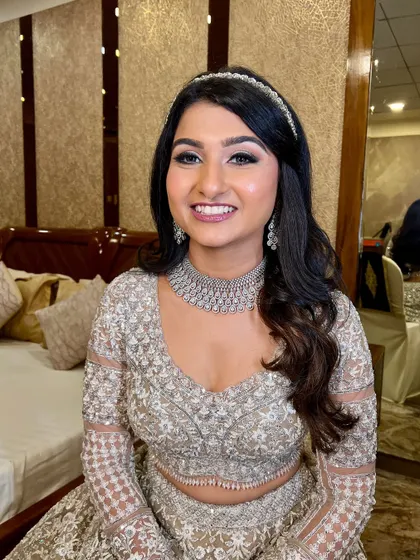 A final close-up, capturing her fresh and glowing makeup.