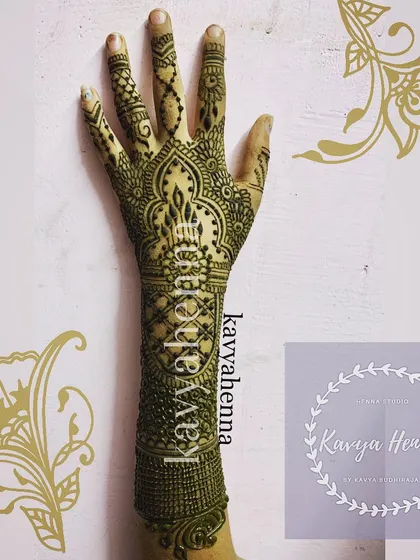 An intricate party henna design extending from the fingers to the wrist. This piece features a central candle motif surrounded by detailed geometric and floral patterns, perfect for a festive occasion.