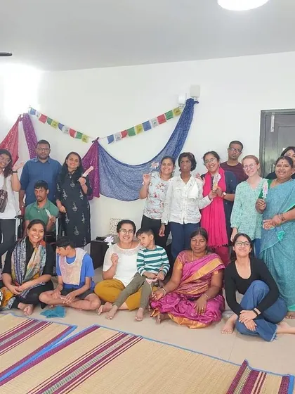A group photo with the amazing children and staff at Snehadhara Foundation after a day of stories and activities.