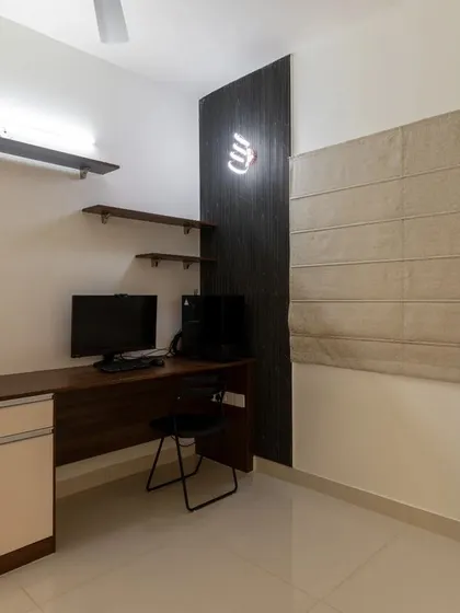 We designed this compact home office and study nook with simple shelving and a minimalist desk to create a functional workspace without clutter.