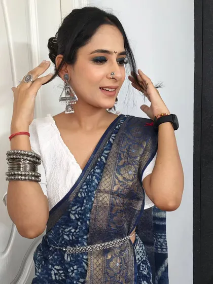 A playful shot showing off the complete Maharashtrian-inspired look. It's all about embracing the culture.