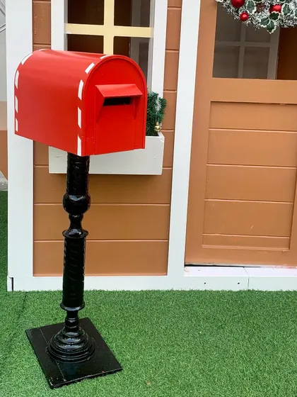It's the little details that count. This Santa mailbox is a perfect complementary prop for our gingerbread house or any North Pole-themed display.