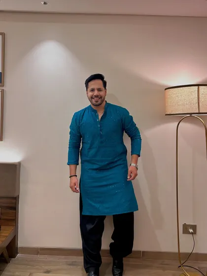 Rocking a teal blue kurta for another event. I believe in dressing for the occasion, and my wardrobe has a range of options to fit any theme or color scheme.