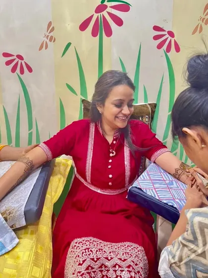 A happy moment with my beautiful bride Nidhi during her mehendi session. I cherish these connections forever.