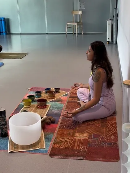 A moment of quiet meditation during a private session at IKEA. Even in unconventional spaces, we can create a sanctuary for healing and introspection.