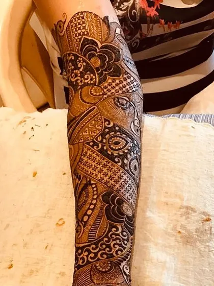 A full arm of intricate, flowing patterns. This is the kind of design you can get lost in.