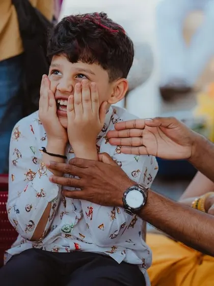 The pure, unadulterated joy of a child watching the wedding festivities is always a special moment to capture.