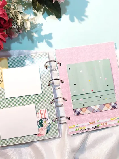 A green-themed page in the Ring Album with space for two photos.