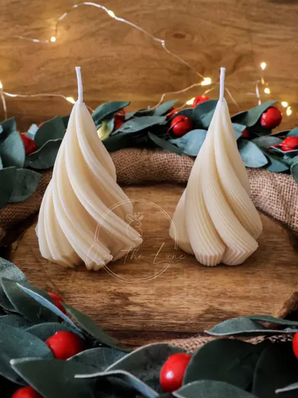 The swirl Christmas tree candles are a simple yet sophisticated decor piece for the holidays.