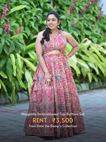 This magenta embroidered top and bottom set is a fun, vibrant, and comfortable choice for a Mehendi party.