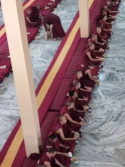 A closer view of the Sangha community receiving offerings during the Geshe ceremony at Sera Jey. We offer our deep gratitude to the monks for facilitating our participation in this event.
