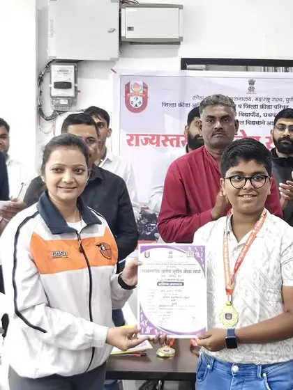 Rudra Patil receiving his gold medal at the Interschool State Tournament. His score of 397/400 is a reflection of his exceptional talent and our high-quality training.