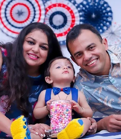 A fun studio session for a little boy's milestone, complete with a jar of colorful candies.