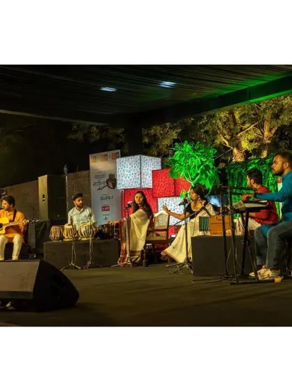 The full band performing for a large audience at Sahitya AajTak.