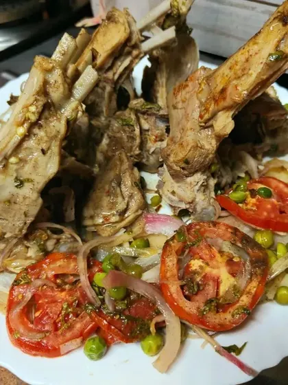 Succulent baked lamb chops, seasoned with herbs and spices. This is a fantastic option for a formal sit-down dinner or a special occasion feast.