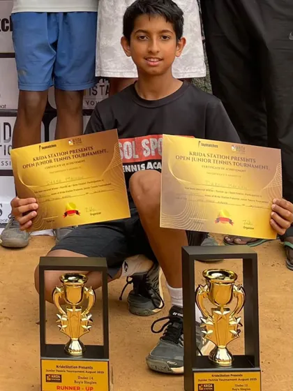 Darsh Malhan with his trophies from the Open Junior Tennis Tournament. His success, winning the U12 singles and finishing as runner-up in U14, shows our focus on helping players compete effectively across age categories.