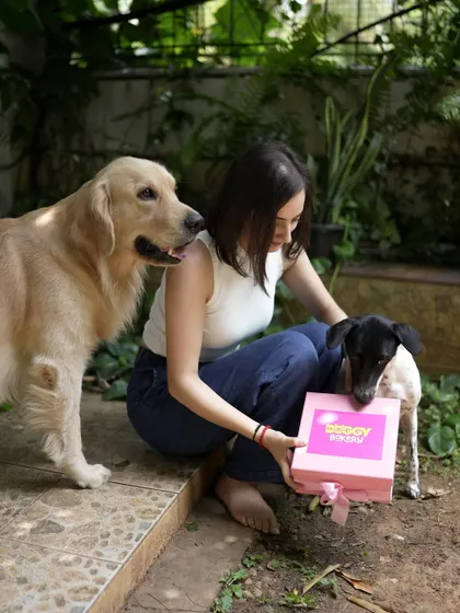 A happy moment shared between a dog mom and her two pups with one of our gift boxes. Our treats are now available in Mumbai, bringing joy to more furry friends.