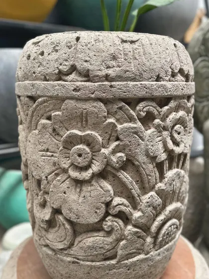 A duplicate image of the intricately carved 'Madu' planter.