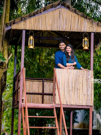 A unique shot of a couple in a bamboo treehouse. This is a great option for adventurous couples looking for a rustic and natural setting.