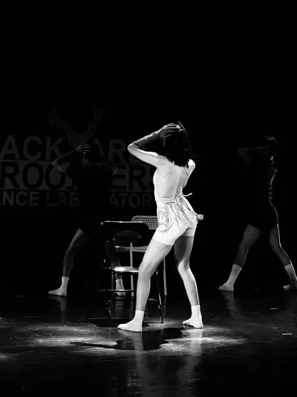 The silhouette of a dancer telling a story. There's something timeless and classic about a jazz performance captured in black and white.
