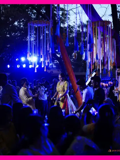 The bride and groom enjoying a neon rain dance at their Haldi party. This fun and unique concept shows my ability to create truly memorable and out-of-the-box experiences.