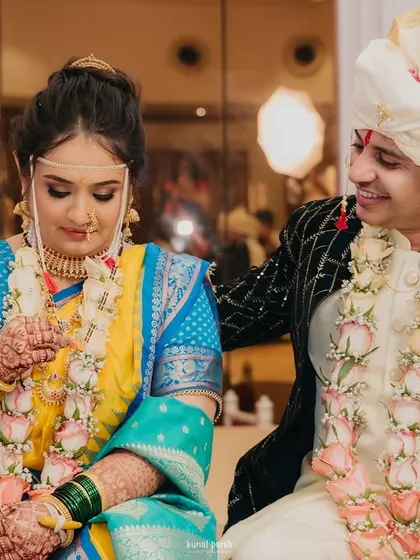 A beautiful moment from a real Maharashtrian wedding. I ensure my bride's makeup is perfect from every angle and stays fresh through all the rituals.