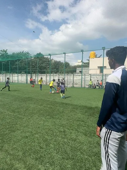 A coach watches intently from the sidelines during the U10 Samurai Cup.