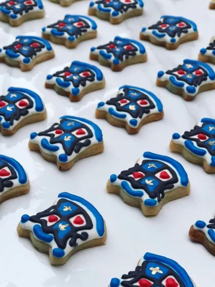 It was such an honor to make these custom sugar cookies for the 175th anniversary of my old school, Loreto Convent. This is just one of the four house colors I made, showing the detailed logo work I can do with royal icing, even for large orders.