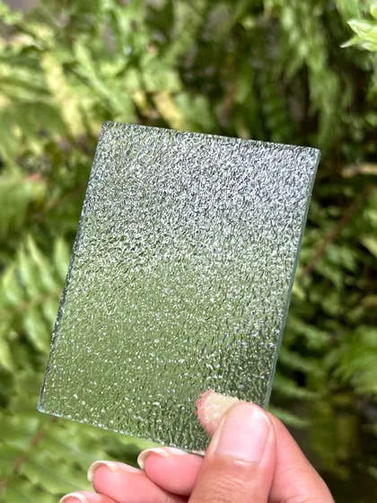 This week's texture is a stippled glass. It offers privacy while still allowing light to filter through, making it a great choice for partitions or windows where you want to create a soft, diffused glow.