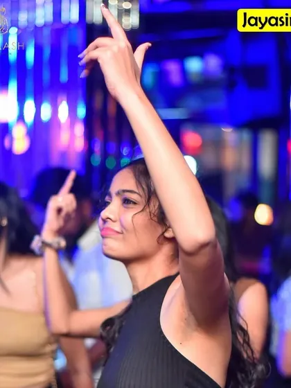 A partygoer dancing her heart out at Badmaash.