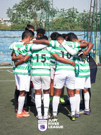 A team in green and white striped jerseys in a tight huddle, showcasing their unity. Our events are designed to bring colleagues closer together through shared challenges.